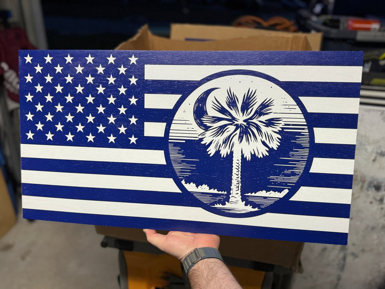 Blue and white wooden American flag with a palmetto tree and moon