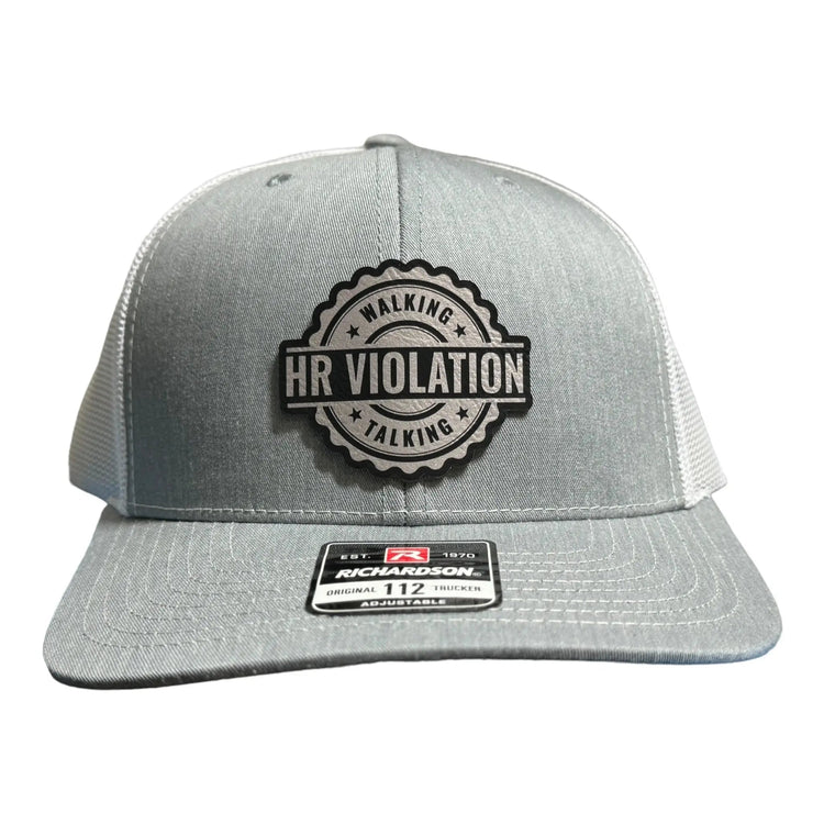 Walking Talking HR Violation Acrylic Patch design shown on a trucker hat